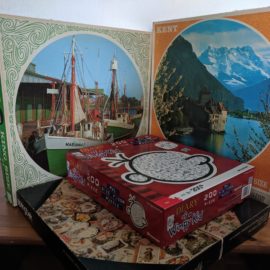 Four jigsaw puzzles from library book sale
