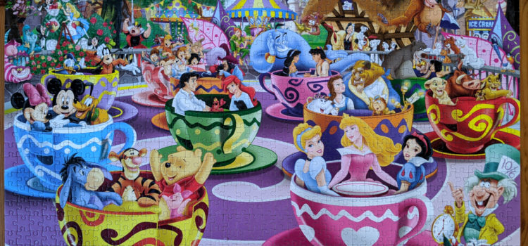 Disney characters riding Mad Tea Cup